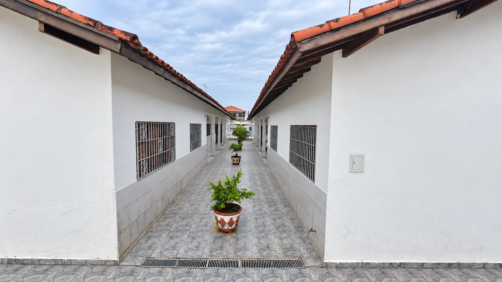 Condomínio Condominio Residencial Sintra em Maracanã, Praia Grande - foto 2